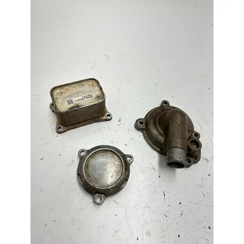 22 2022 Can-Am Maverick Sport 1000 Max OEM Oil Cooler Water Pump Cover Filter