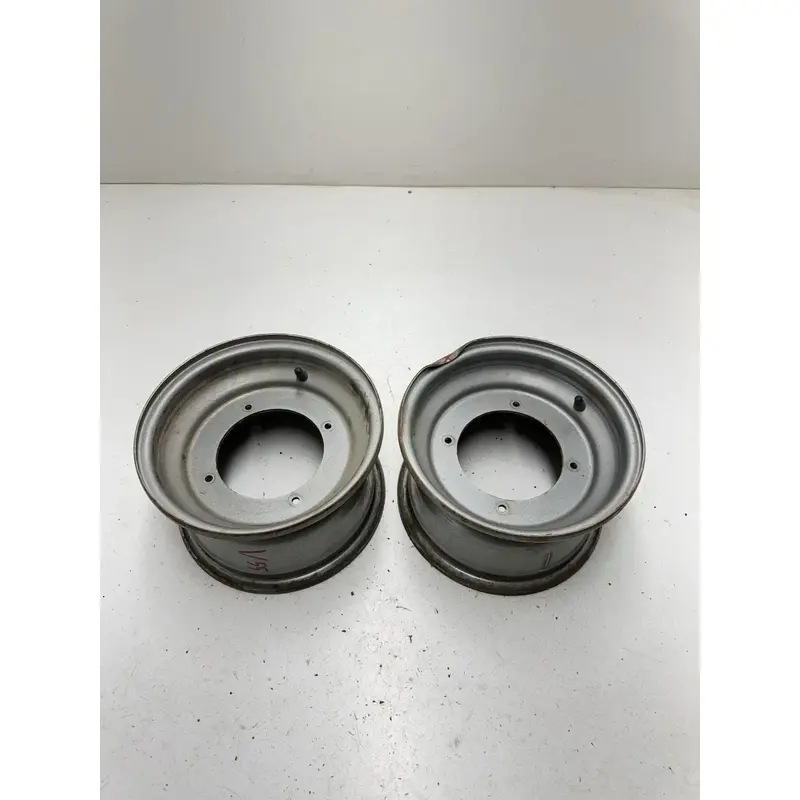88 1988 Polaris Trail Boss 250 4x4 OEM PAIR Front Wheel Rim Rims